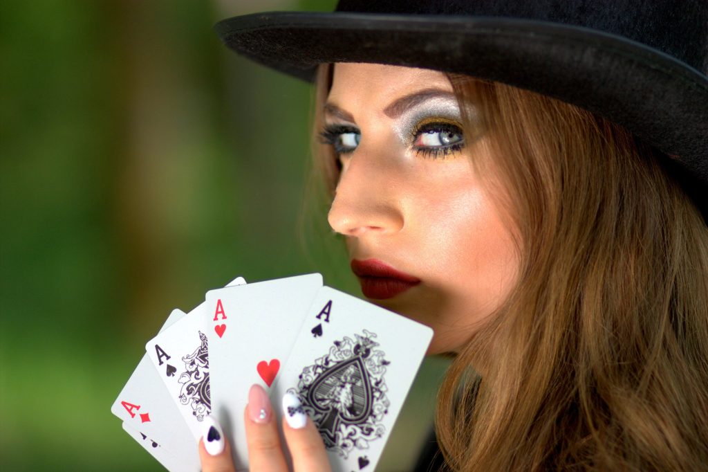 Texas poker hands woman with game cards